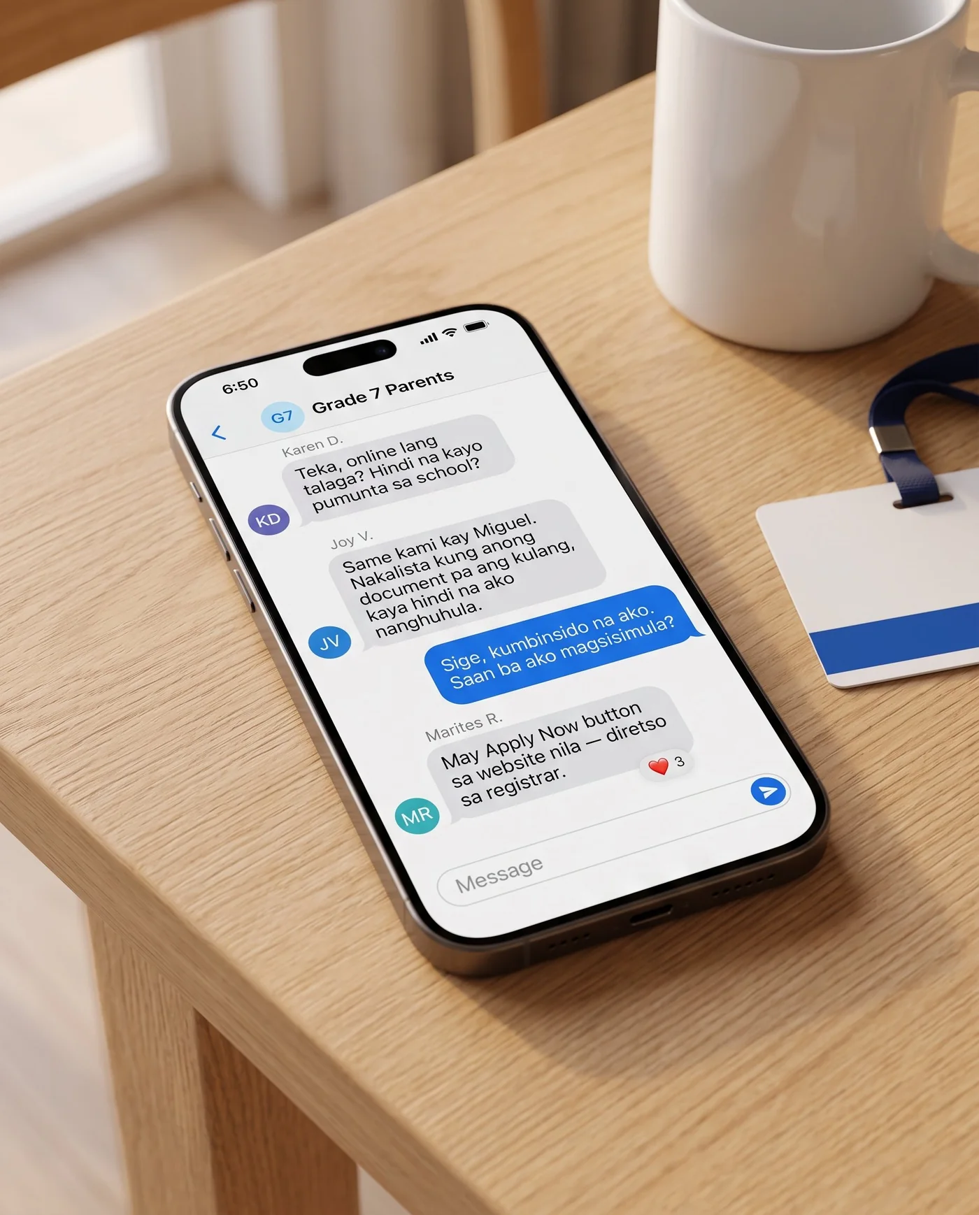 A phone lying on a wooden table beside a coffee mug, showing a parents' group chat called Grade 7 Parents. Karen D.: “Teka, online lang talaga? Hindi na kayo pumunta sa school?” Joy V.: “Same kami kay Miguel. Nakalista kung anong document pa ang kulang, kaya hindi na ako nanghuhula.” The phone's owner: “Sige, kumbinsido na ako. Saan ba ako magsisimula?” Marites R.: “May Apply Now button sa website nila — diretso sa registrar.” Three parents reacted with a heart.